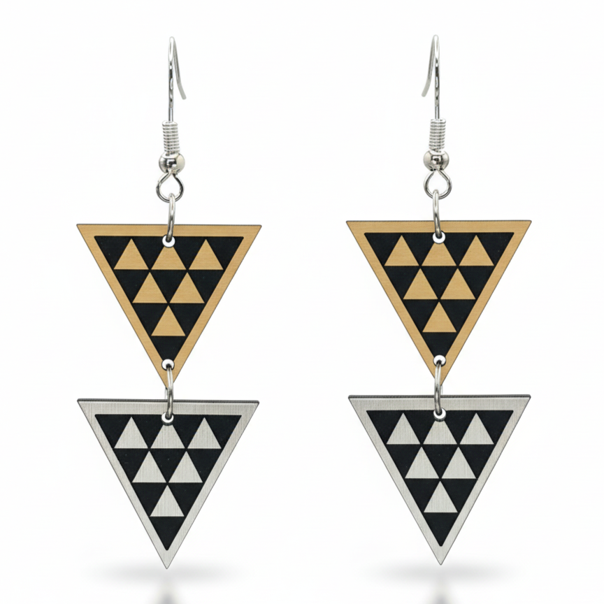 Tāniko Double earrings, stacked triangles with tāniko pattern in brushed gold and brushed silver metallic.