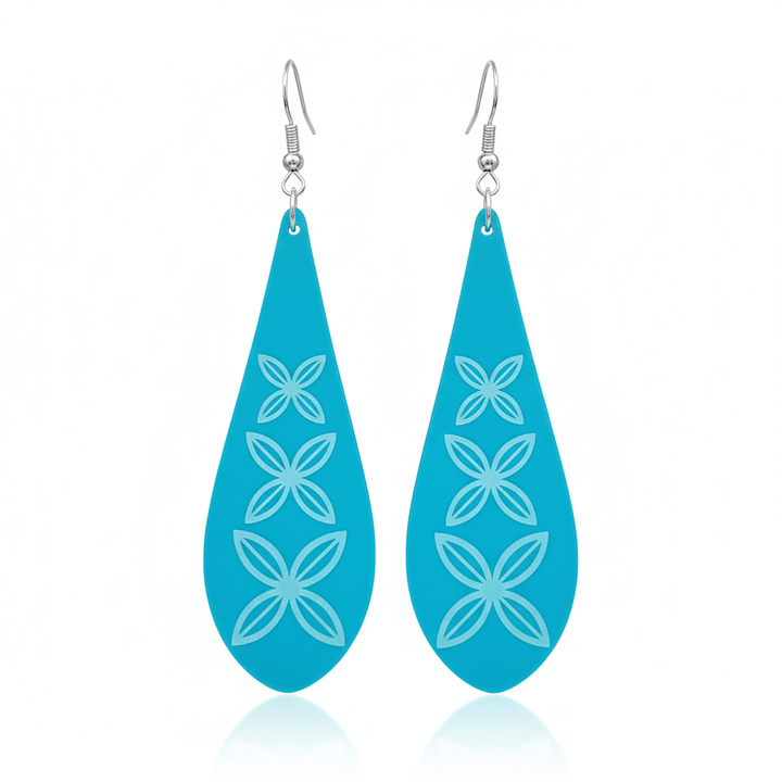 Frangipani Drop earrings, engraved frangipani petals in aqua acrylic teardrops.