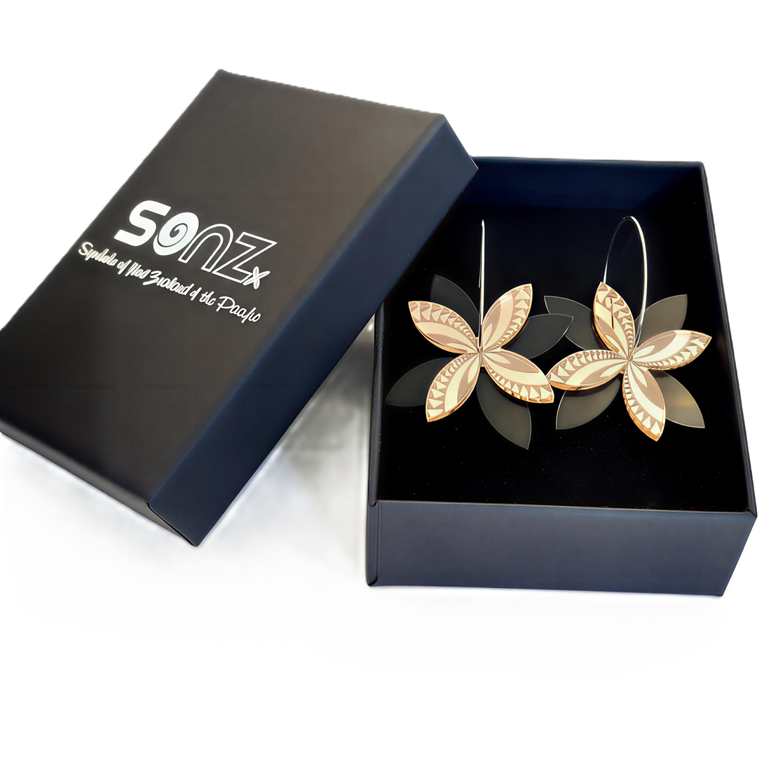 Frangipani Swirl Spinner earrings in SoNZ gift box; rose-gold mirror acrylic with black acrylic petals.