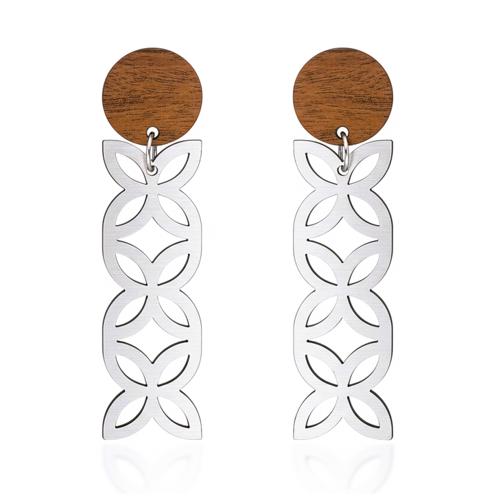 Frangipani Triple Wood Stud earrings, stacked open-petal drops in brushed silver metallic with natural wood studs.