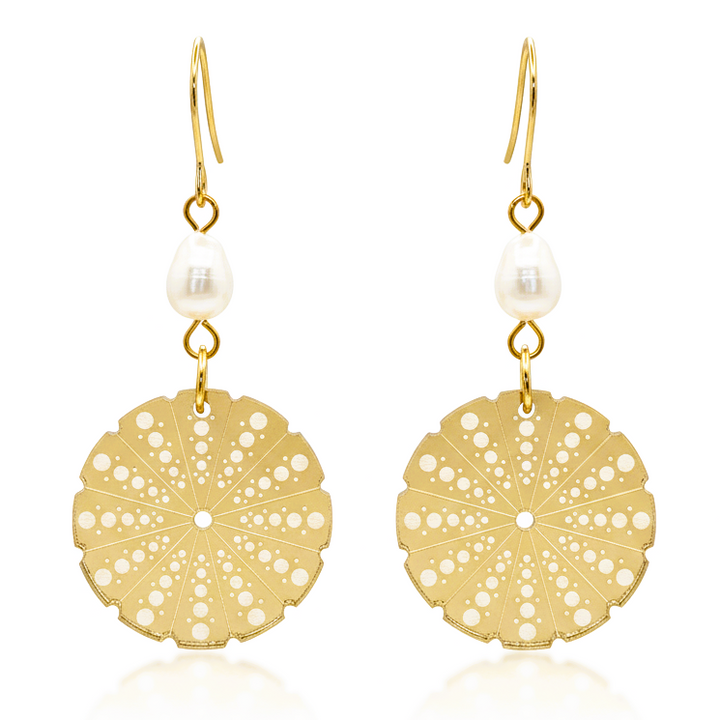 Kina Pearl earrings with a kina-inspired disc in gold mirror acrylic and a natural freshwater pearl link.