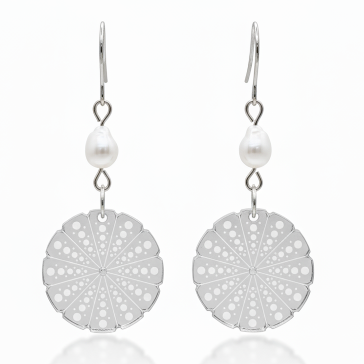 Kina Pearl earrings with a kina-inspired disc in silver mirror acrylic and a freshwater pearl link.