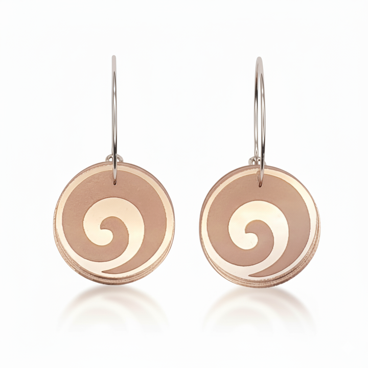 Koru Engraved hoop earrings, small round discs with engraved koru spiral in rose-gold mirror acrylic.
