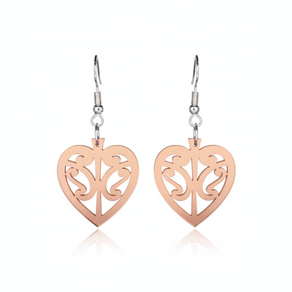 Kōwhaiwhai Heart earrings, open heart with kōwhaiwhai cut-outs in rose-gold mirror acrylic.