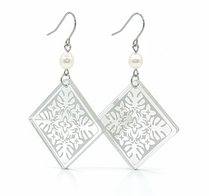 Monstera Diamond Pearl earrings, diamond silhouette with monstera lattice in silver mirror acrylic and a freshwater pearl link.