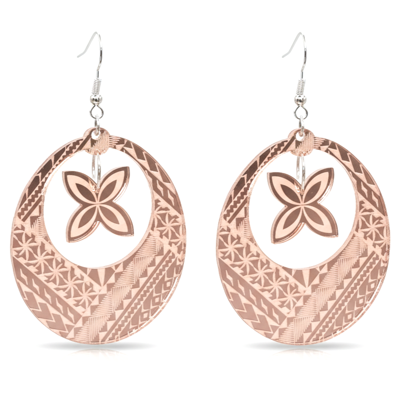 Samoan Hoop Frangi earrings, open hoops with engraved Samoan motifs and a frangipani charm in rose-gold mirror acrylic.