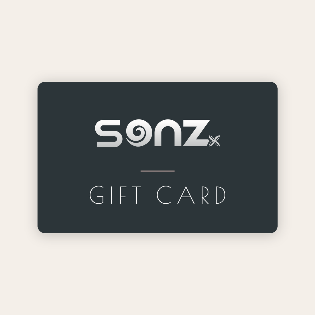 SONZ gift card on a charcoal card against a warm beige background